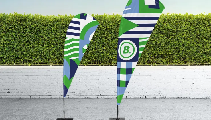 Beach flags are all the rage. Hip, fresh and set up in an instant. 