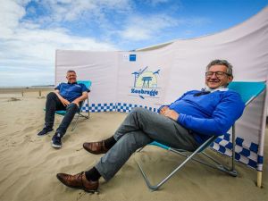 Bedrukte strandschermen zeebrugge windscherm