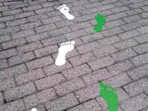 Vloerstickers op stenen voor buiten